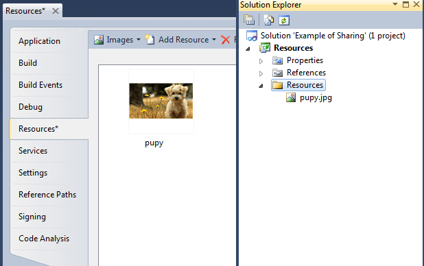 Например, вкладка 'Ресурсы' проекта 'Ресурсы' показывает изображение щенка, а 'Обозреватель решений' показывает, что в папке 'Ресурсы' проекта 'Ресурсы' содержится изображение щенка.